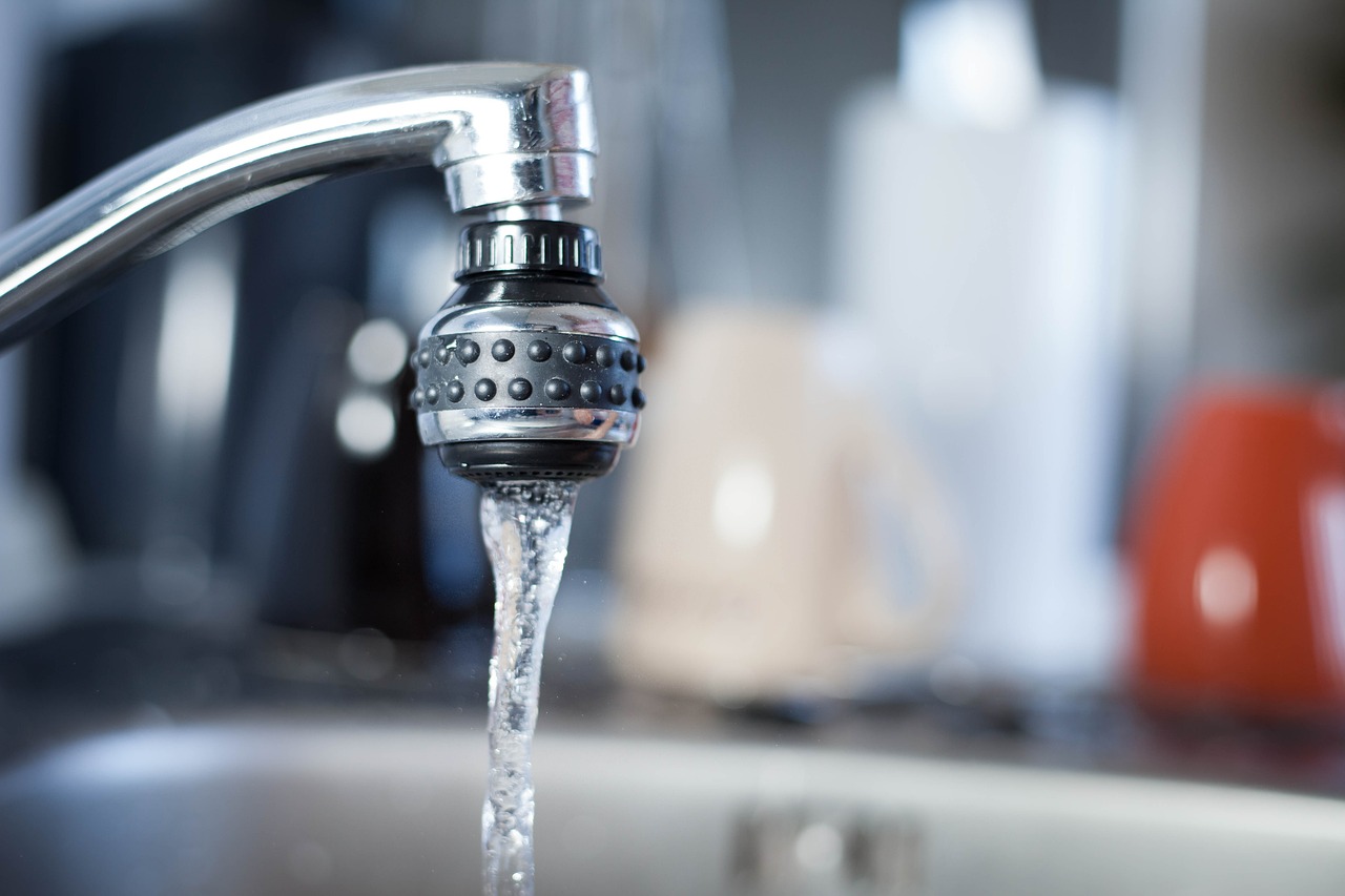 kitchen tap with water running